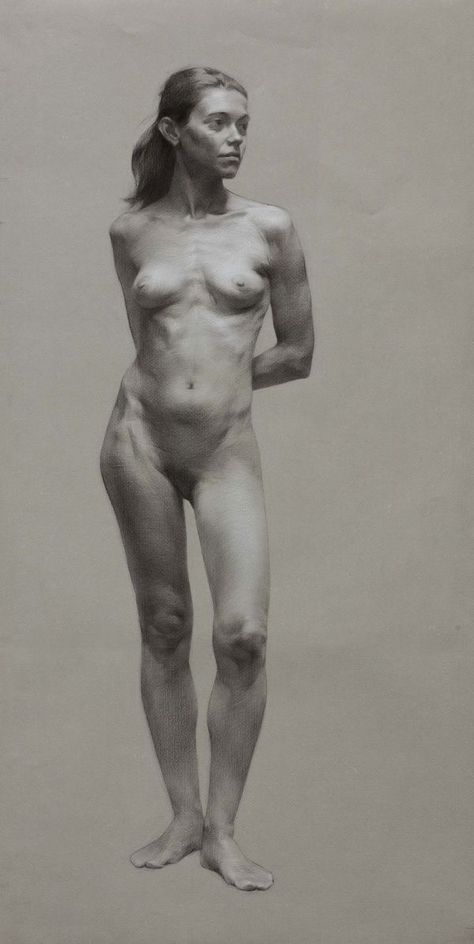 a nude woman standing in front of a white background