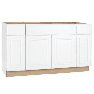 a white kitchen cabinet with two doors and drawers on the bottom, in front of a white background