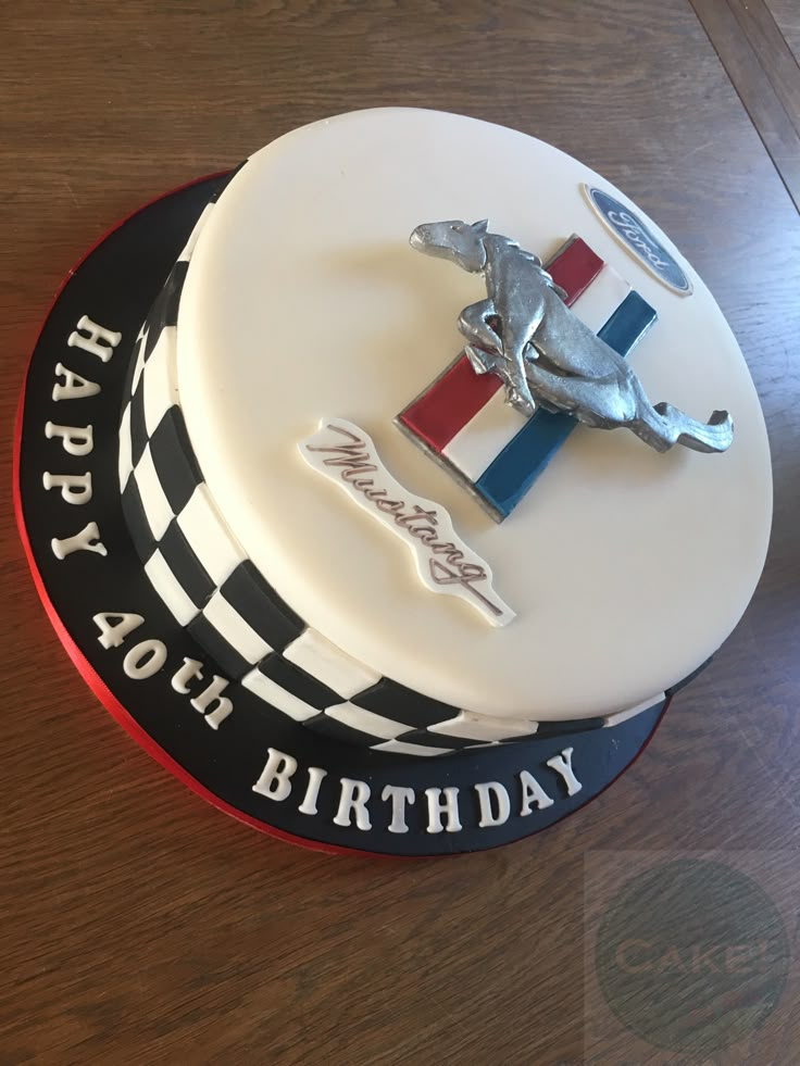 a birthday cake with a racing theme on it