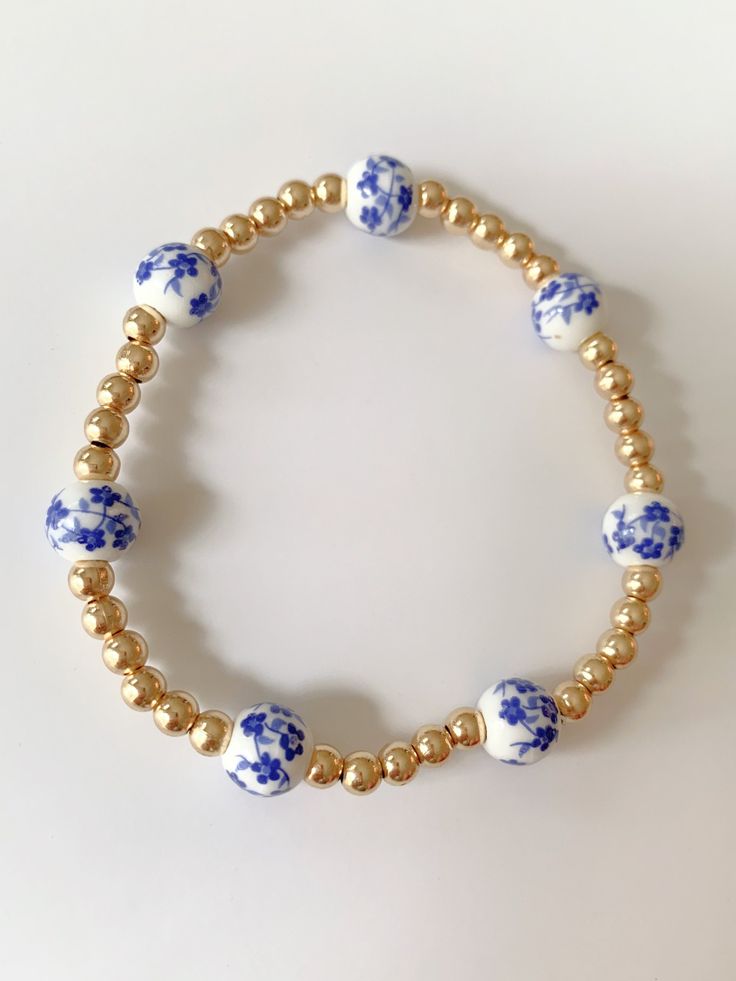 Blue Floral gold beaded bracelet Gold Beaded Bracelet, Preppy Jewelry, Beading Jewelery, Gold Bead Bracelets, Jewelry Board, Jewelry Boards, Jewelry Lookbook, Pretty Jewelry, Pretty Shoes