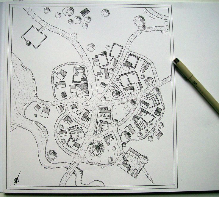 a drawing of a city with lots of trees and houses on it, next to a pencil