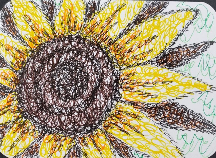 a drawing of a sunflower with writing on it