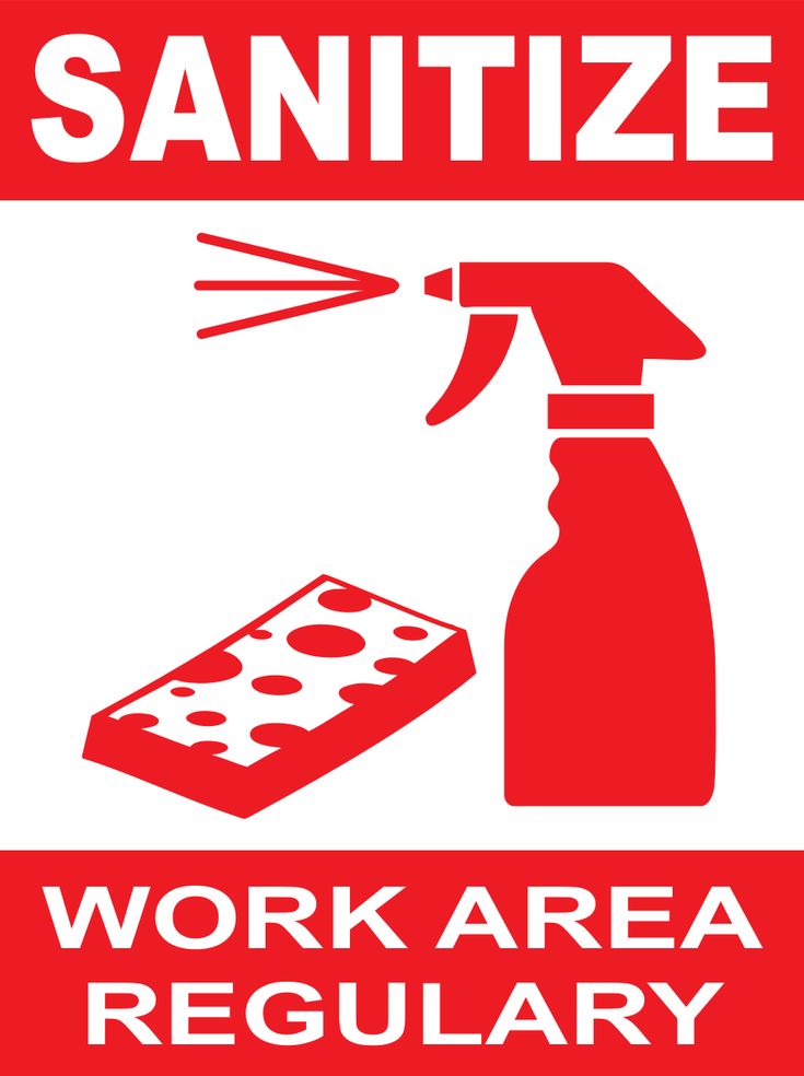 a red and white sign that says, work area regular sanitize with a spray bottle