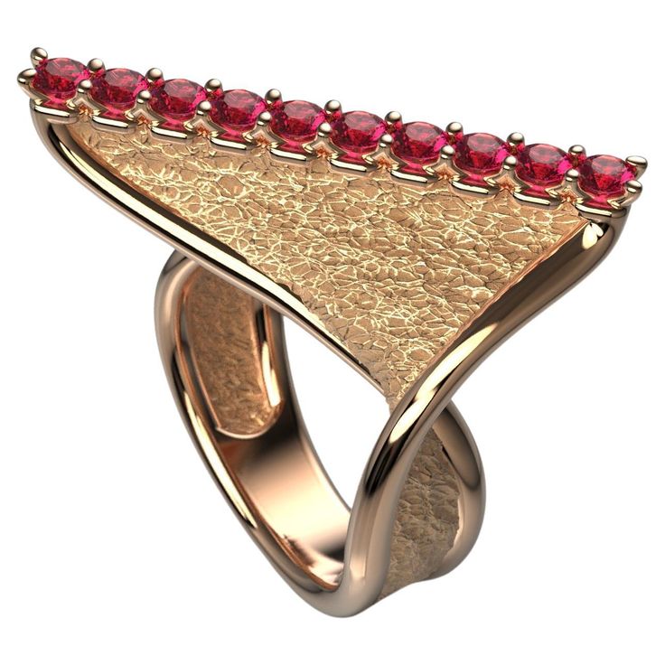 Indulge in the luxurious craftsmanship of our Modern Twisted 18k Gold Ring, an exclusive design by Oltremare Gioielli. This elegant ring features a striking twisted band with polished edges and an earth-textured surface, perfectly balancing modern aesthetics with timeless sophistication. The top ridge is adorned with 10 round, natural rubies (2.8mm each, approximately 0.82 carats), adding a vibrant pop of color and sparkle to the rich 18k gold setting. Handcrafted in Italy, this piece offers exceptional quality and a refined finish, perfect for those who appreciate artisanal excellence. Looking for a personal touch? You can fully customize this ring with the gemstones of your choice, allowing you to create a meaningful piece tailored to your style. Production time for this jewelry varies f Luxury Ruby Ring For Party, Luxury Yellow Gold Rings With Unique Design, Luxury Formal Rings With Unique Design, Luxury Rings With Unique Design For Formal Occasions, Luxury Formal Ring With Unique Design, Elegant Party Ruby Ring, Gold Ruby Ring With Tension Setting For Formal Occasions, Luxury Bypass Ring With Polished Finish, Yellow Gold Open Ring For Evening