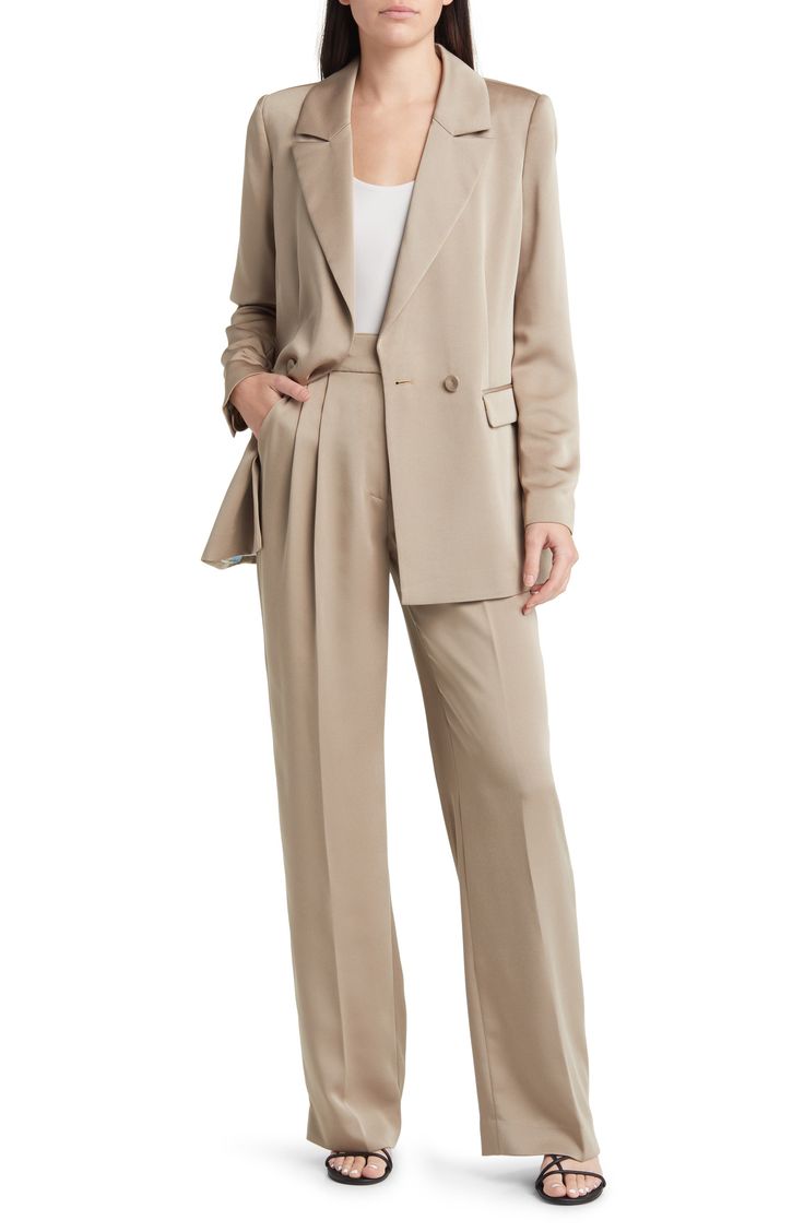 Chic for the office or a night out, these wide-leg trousers are fashioned from smooth woven fabric and pleated at the superhigh waist to further the flowy fit. 32" inseam; 20" leg opening; 13 1/2" front rise; 16" back rise (size 8) Zip fly with hook-and-bar closure Front slant pockets; back welt pockets 100% polyester Machine wash, tumble dry Imported Elegant Wide Leg Viscose Pants, Chic Beige Wide Leg Pants For Evening, Formal Viscose Wide-leg Pants, Wide Leg Viscose Pants For Work, Wide Leg Viscose Workwear Pants, Viscose Wide-leg Pants For Formal Occasions, Elegant Wide-leg Formal Culottes, Elegant Formal Wide-leg Culottes, Elegant Ankle-length Viscose Wide Leg Pants