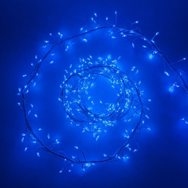 blue lights are arranged in the shape of a circle