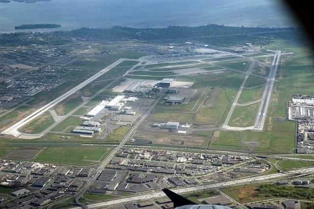 an aerial view of the runway and airport