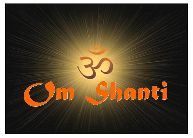 the om shanti symbol in front of a black background with orange and yellow rays