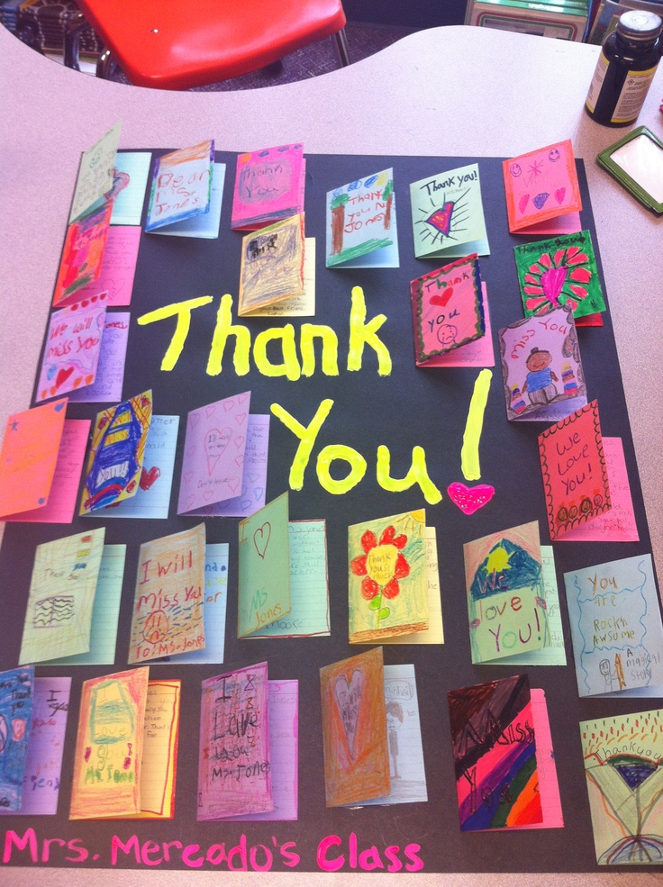 a thank you sign made out of colorful cards