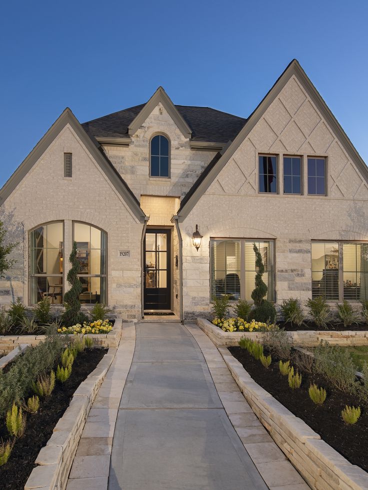 the front entrance to a home at dusk