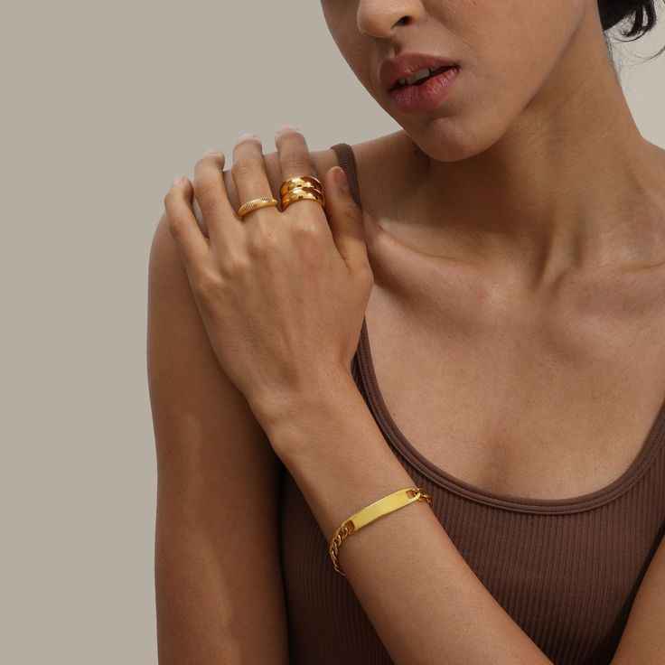 The 18K Gold Plated Maeve Ring, designed with simplicity in mind. The perfect accessory for every occasion. It looks beautiful on its own, or stacked with your other favourites, whatever you choose, you can't go wrong with this one. When you're not wearing this piece, tuck it away in your very own Milou jewellery box provided. Stainless Steel, plated with 18K Gold Waterproof (Tarnish Resistant) Natural Linen Milou Jewellery Box Included For ring sizing, please see our Size Guide for details FREE Maeve Ring, Family Bracelets, Natural Linen, Jewelry Care, Necklaces Bracelets, You Choose, Size Guide, Jewelry Box, Jewelry Rings