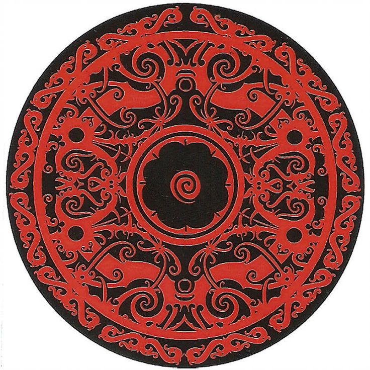 a red and black circular design on a white background