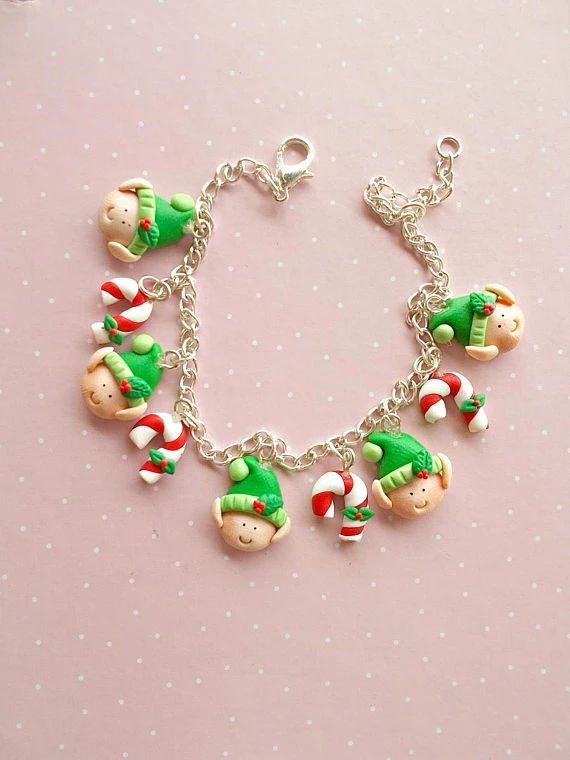 a bracelet with christmas decorations on it