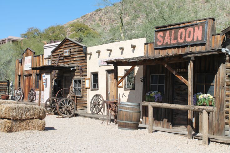 an old western town with wooden buildings