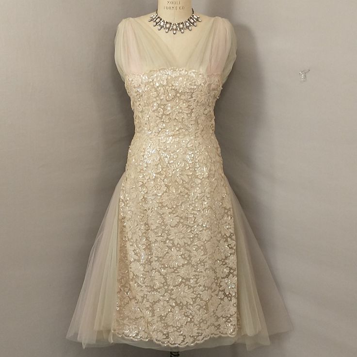 Gorgeous And Unusual, High Quality Vintage Dress. Pale Blush Pink With Cream. Estimated Fifties/Sixties. Overall Good Condition, With One Panel Of Pink Netting Missing (See Pic). For Sizing Please Go By Measurements, Shown On An 8 ( Nice Fit, Some Room) And A 6 Dress Form (Loose). Length Is 48", Bust 38", Waist 30", Hips 40". Label Is Fredleys, . . .Boston, Providence, Wellesley. Unique Find. Feminine, Romantic, Ethereal. Well Worth The Small Repair Or Very Wearable As Is. Delicate Fitted Dress With Sheer Bodice, Spring Party Ethereal Dresses, Ethereal Spring Party Dresses, Ethereal Sleeveless Party Dress, Delicate Fitted Evening Dress, Cream Sleeveless Party Evening Dress, Cream Sleeveless Evening Dress For Party, Cream Tulle Dress With Sheer Bodice, Beige Lace Patchwork Party Dress