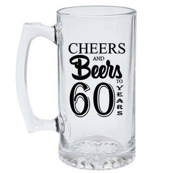 a glass mug with cheers and beers on it