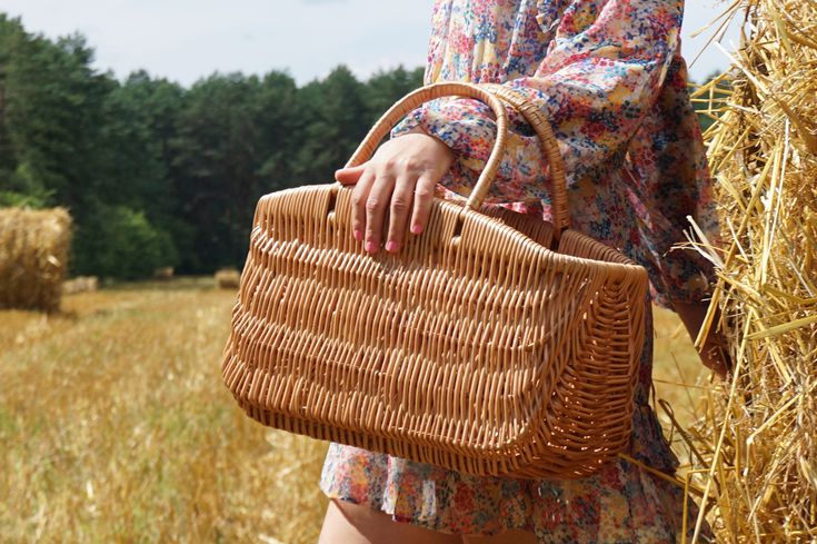 This is an absolute summer must-have ! Description This cute, basket bag is the perfect accessory, great for going to the beach, a casual day out around town, a quick walk in the park, for the farmers market or just a cozy afternoon in the cafe. Its spacious interior will easily hold your beach towel, sunscreen and flip-flops. An ideal gift for the beach! We really love this fashionable and environmentally-friendly bag! This natural, eco-friendly handbag is handmade by wicker. This bag is a fun, Rectangular Beach Bag With Top Carry Handle For Summer, Brown Summer Bags For Picnic, Brown Bag For Summer Picnic, Brown Summer Picnic Bag, Brown Bags For Summer Picnic, Large Capacity Rectangular Picnic Bag, Eco-friendly Summer Satchel With Handles, Vintage Summer Bags For Picnic, Summer Rectangular Satchel With Leather Handles