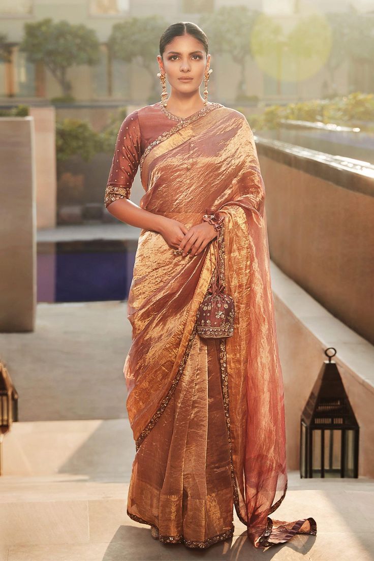 Shop for Matsya Pink Meera Wrinkled Tissue Saree With Blouse for Women Online at Aza Fashions Pink Tissue Saree Blouse Designs, Blouse Designs For Tissue Sarees, Tissue Silk Saree With Border, Tissue Organza Saree Blouse Designs, Tissue Silk Saree Blouse Design, Closed Neck Blouse Designs, Tissue Saree Blouse Designs Latest, Golden Saree With Contrast Blouse, Pink Tissue Saree