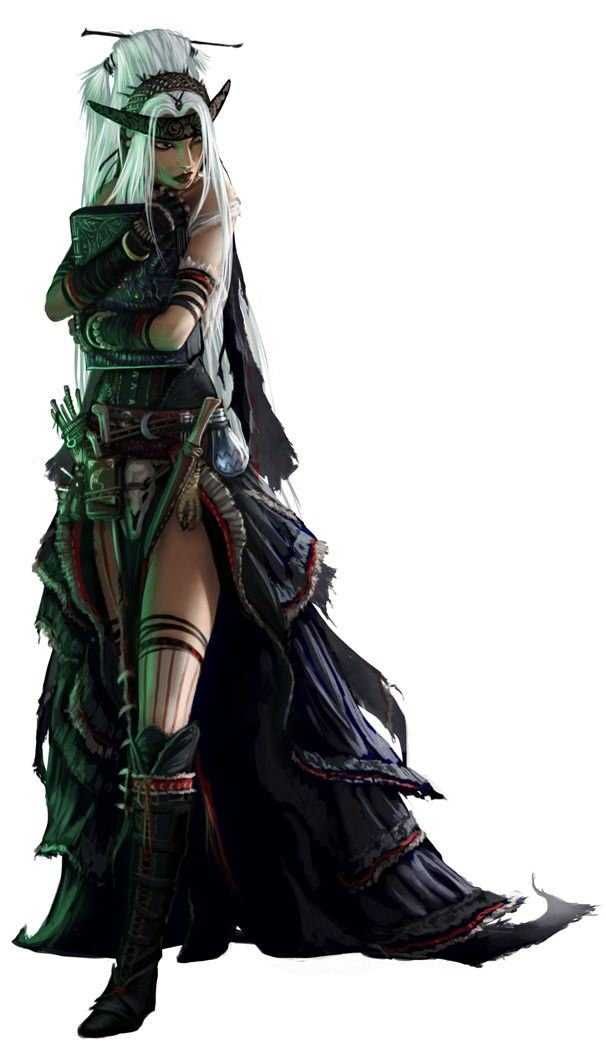 a woman dressed in black and green is standing with her hands on her hips while wearing an elaborate costume