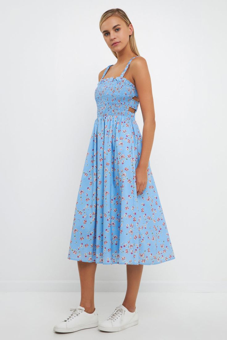 This dress is sure to turn heads. With delicate smocking detail and a flattering midi length, this frock is perfect for any special occasion. The elastic at the back makes it easy to fit a range of body types, while the vibrant print ensures you'll stand out from the crowd. Whether you're attending a summer wedding or a formal gala, this dress is sure to make a statement. Smocking detail Midi length Elastic at back Hand wash cold Do not bleach Do not tumble dry Iron low Shell: 97% Cotton 3% Span Blue Smocked Bodice Midi Dress, Smocked Dress, Stand Out From The Crowd, Summer Wedding, Midi Length, Body Types, Smocking, Blue Dresses, Special Occasion