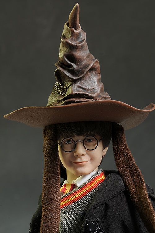 a harry potter doll wearing a brown hat