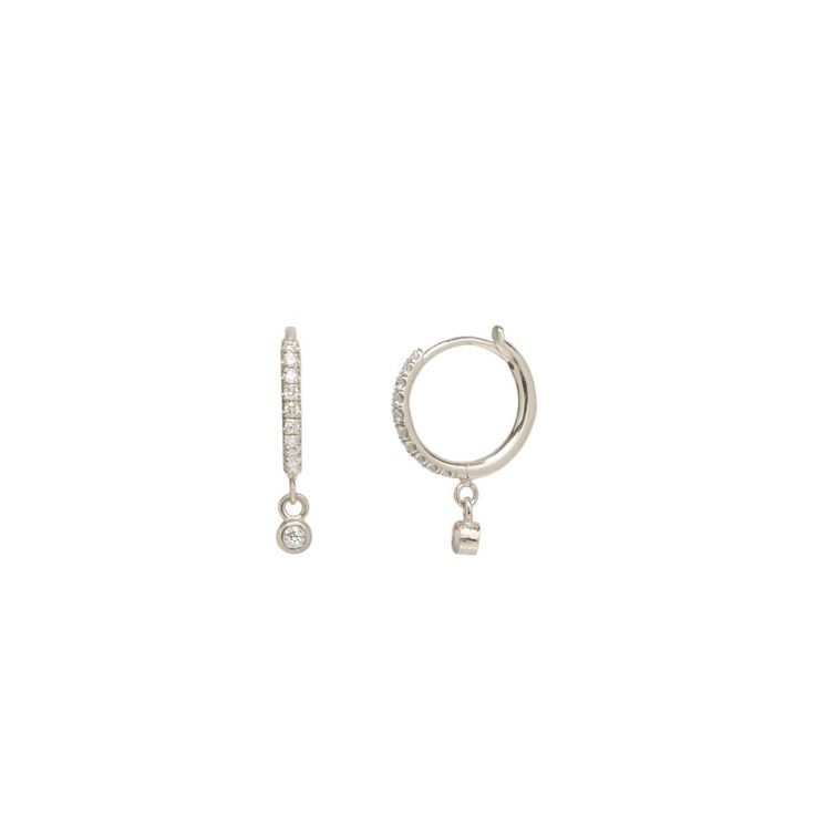 14k gold white pave diamond medium hinge huggie hoops with dangling bezel set diamonds SPECIFICS• hoops are approx. 12mm diameter • approx. 16mm drop • white pave diamonds .13 ctw• sold as pair or single White Gold Dangle Huggie Earrings Fine Jewelry, Dangle Huggie Earrings With Diamond Accents, Diamond Dangle Huggie Earrings Fine Jewelry, Zoe Chicco, Bezel Set Diamond, Huggie Hoop Earrings, Bezel Diamond, Ring Size Guide, Diamond Fashion