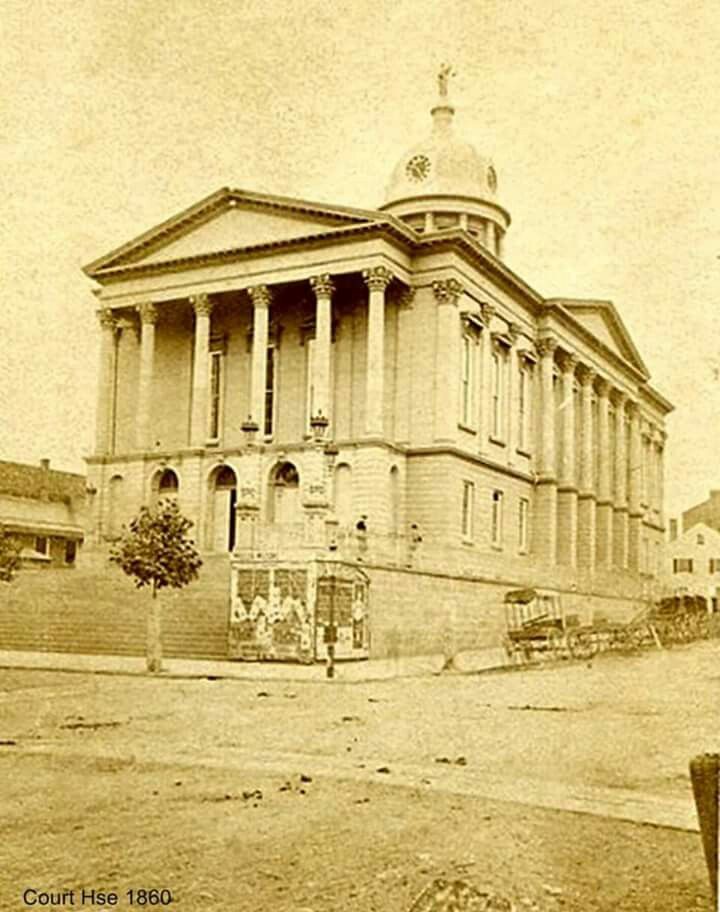 an old photo of a building in the early 1900's