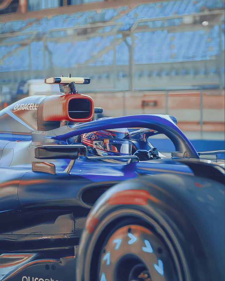 a close up of a racing car on a track