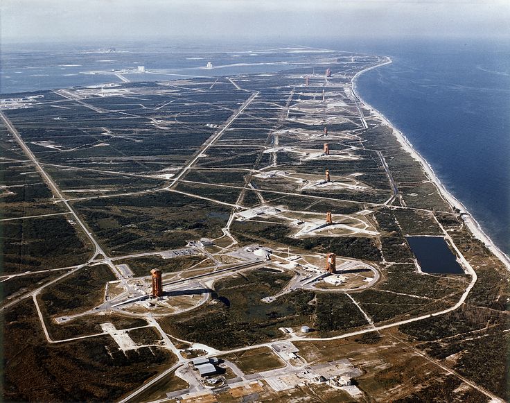 an aerial view of the ocean and land