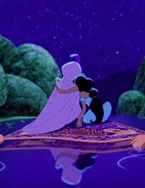 disney's princess and the frog kissing in front of some water with stars in the sky