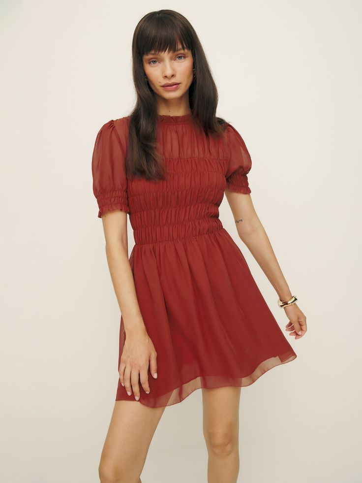 Short and sweet. Shop the Mimsy Dress from Reformation,  a mini dress with a high neckline, short puffed sleeves, and shirring throughout. Extra Dresses, Red Short Sleeve Dress, Green Cotton Dress, Scottish Dress, Elle Dress, Reformation Dress, Shirred Dress, Linen Mini Dress, Swimwear Dress