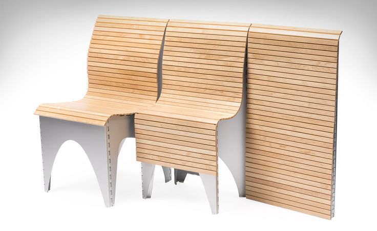 two wooden benches sitting next to each other on top of a white floor covered in wood slats