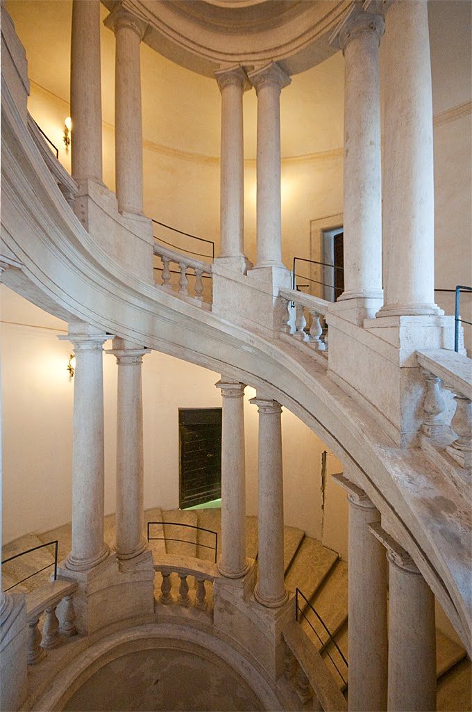 the inside of a building with many columns