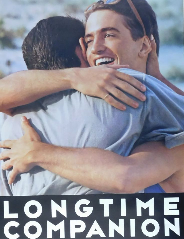 two men hugging each other with the caption long time companion on it's back