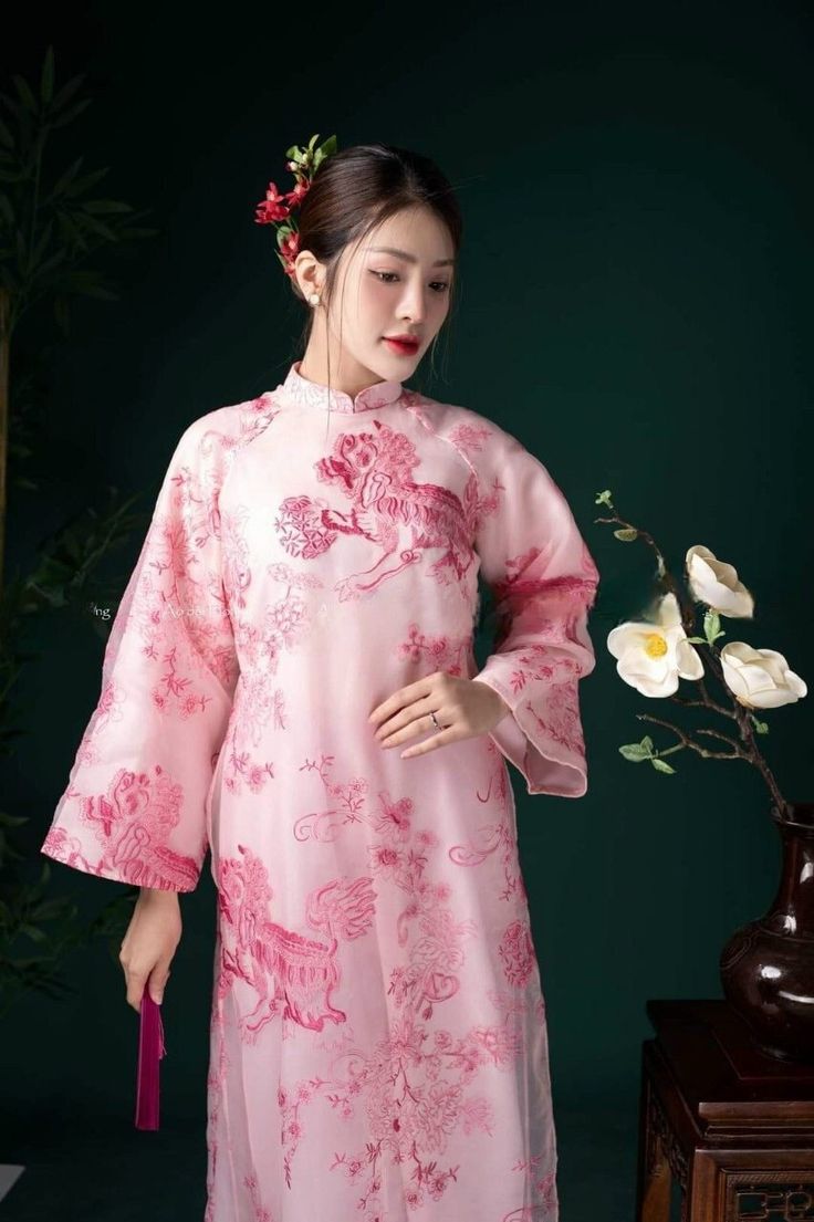 "🌿 This set includes traditional Ao Dai, red pants. Style: Traditional Material: Very well made with high-quality double layers Collar: traditional collar Please provide bust-waist-and hip measurements when placing your order to ensure the best fit for you. 🌿 NOTE: * Recommend gentle washing * Please contact us for any inquiries about size. We don't have an exchange policy for the wrong size * It is safe for a washer and dryer in a \"delicate\" setting. * Actual Ao Dai colors may differ up to 10% due to lightning and viewing devices. * These ao dai pants are made based on Vietnamese size; they will run smaller than American size. *3D printed ao dai: you may see some white broken fabric around the seam (collar). *There might be some chalk/ pen writings on the fabric because it is brand ne Bridesmaid Ao Dai, Ao Dai Red, Lace Ao Dai, Bridal Ao Dai, Vietnam Costume, Wedding Ao Dai, Modern Ao Dai, Blouse Size Chart, Red Pants