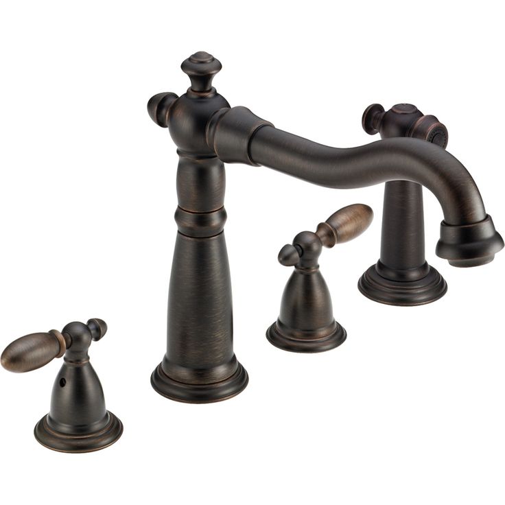 an antique style faucet with two handles and three spray spoutes in bronze