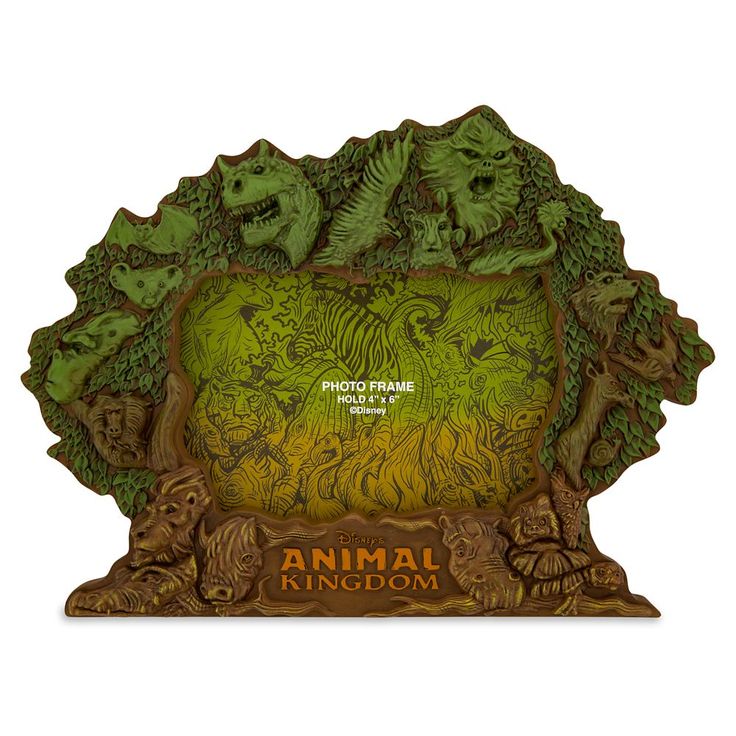 an animal kingdom photo frame with dinosaurs on the front and bottom, in green tones