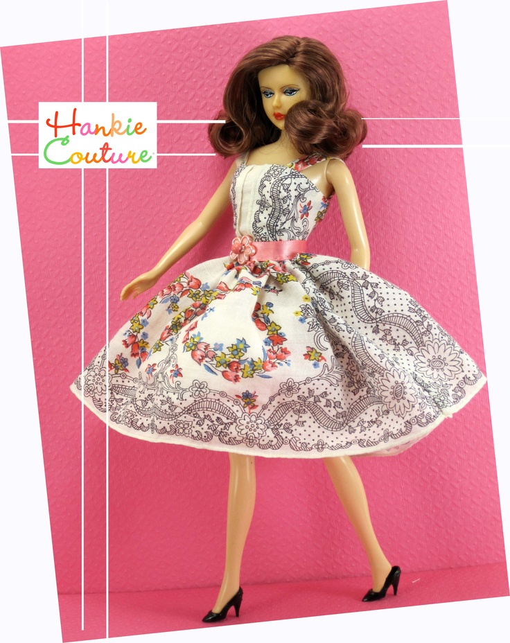 a barbie doll wearing a dress and high heel shoes with the name hankie continue on it