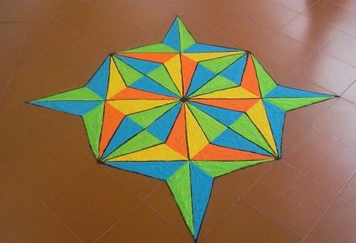 a colorful paper star is on the floor