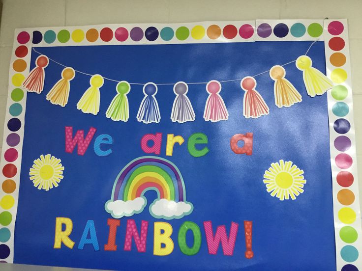 a bulletin board that says we are a rainbow