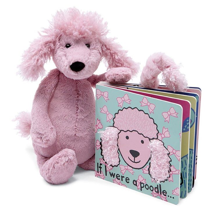 a pink poodle stuffed animal sitting next to a children's book with the words if we were a poodle written on it