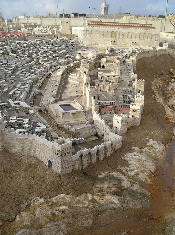 an aerial view of a castle in the desert