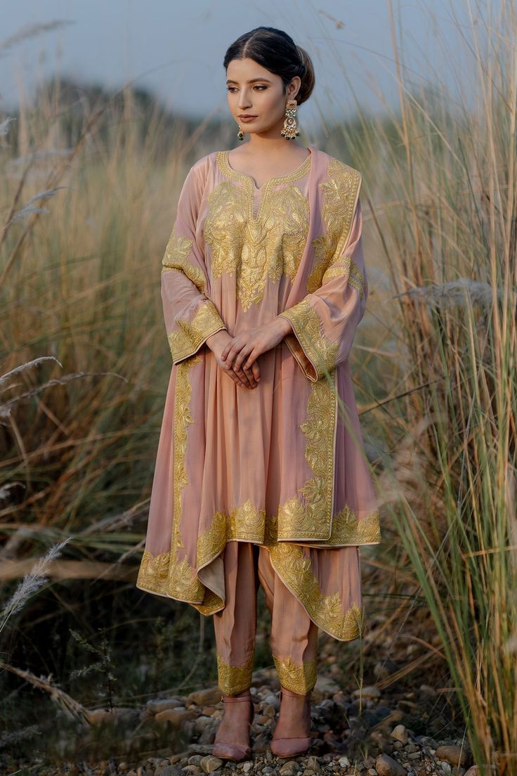 Buy Pink Phiran Kurta And Pant Crepe & Dupatta Georgette Yoke Set For Women by Daljit Sudan Online at Aza Fashions. Kashmiri Outfits For Women, Satin Kurta, Kashmiri Suits, Salwar Pattern, Casual Indian Fashion, Pakistani Dresses Casual, Indian Dresses Traditional, Embroidery Suits Design, Designer Party Wear Dresses