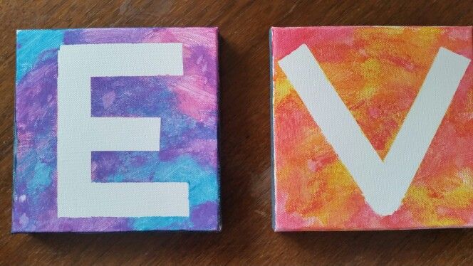 the letters e, v and f are painted on canvases