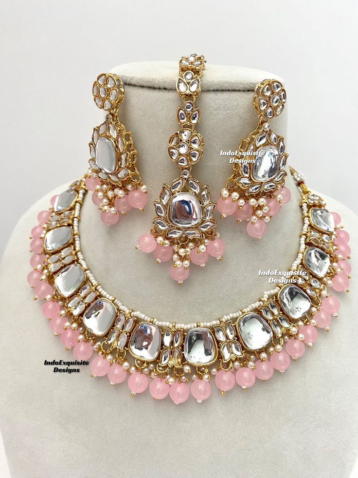 Gorgeous Kundan Necklace comes with lightweight Earrings and Tikka/ Indian Jewelry/Unique Polki and Kundan Jewelry/pink    All items are shipped from Brampton, Ontario, Canada. If you need your item by a certain day, please reach out to us for express delivery option before placing the order so that we can update the shipping for you. Standard shipping/delivery timeline Below are the delivery timeline estimates. We dispatch all orders by the next business day. ---> USA delivery timeline * 3-5 bu Pink Bridal Sets For Party And Festive Occasions, Pink Bridal Sets For Party, Festive Pink Bridal Sets For Party, Elegant Pink Bridal Necklace For Festive Occasions, Elegant Pink Bridal Necklace For Festive Seasons, Pink Jewelry With Matching Earrings For Festivals, Pink Jewelry For Party And Festivals, Pink Kundan Necklaces As Gift, Pink Kundan Necklaces For Gifts