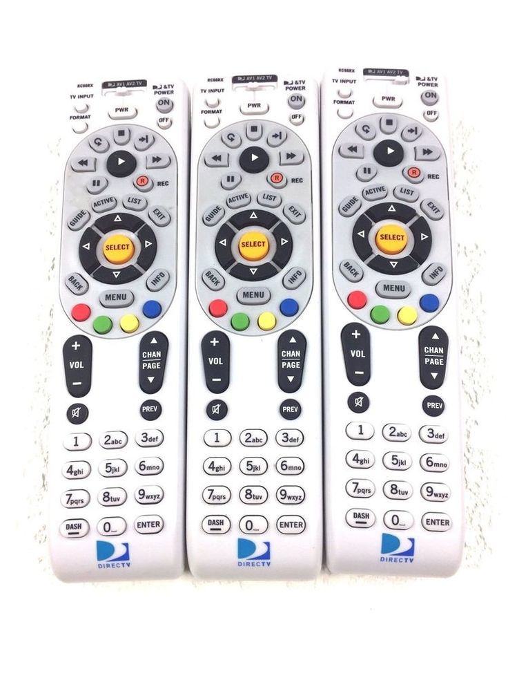 three remote controls sitting next to each other