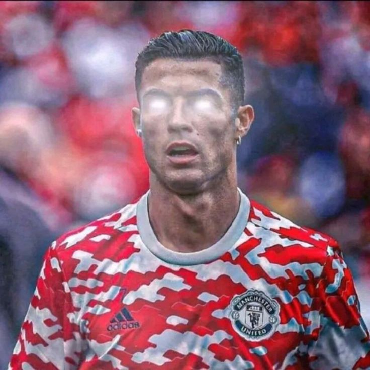 a man with his face painted like a soccer player