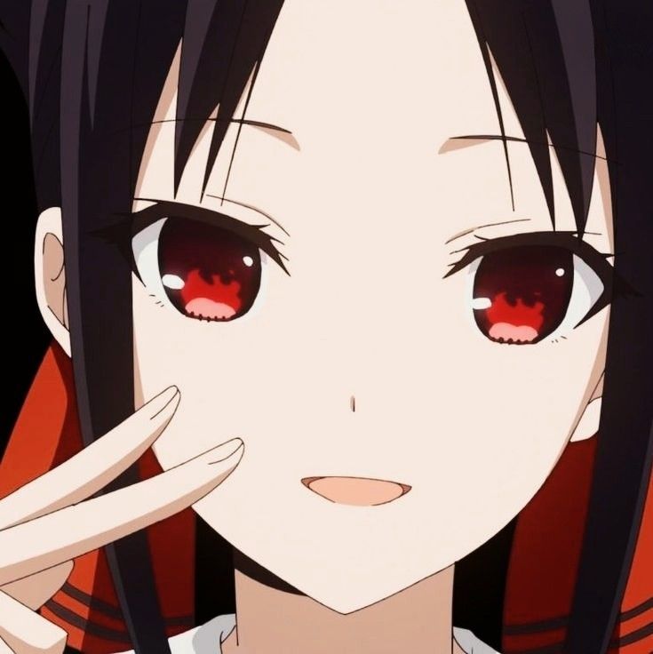 an anime character with red eyes and long black hair holding her hand up to her face