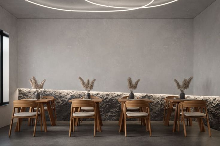 a group of wooden chairs sitting next to each other