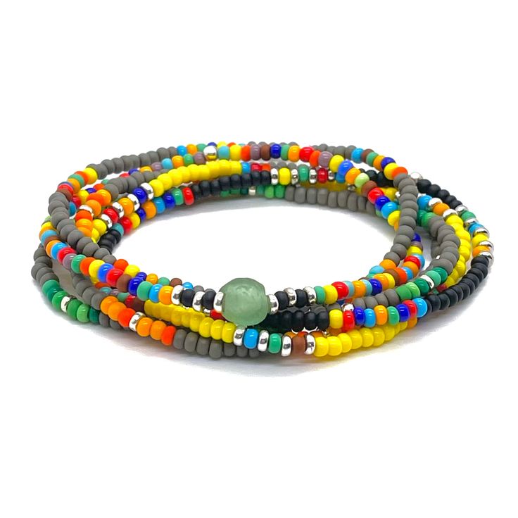 Perfect for Guys who Crave Beach Vibes Year Round Sea glass center bead; glass seed beads; silver-tone glass seed bead disks; finished with a sterling silver bead. Stretch style. Waterproof. Perfect solo or stacked. Handmade in NYC. Beach Bracelets With Colorful Glass Beads, Glass Bracelets With Colorful Beads For Beach, Colorful Glass Bead Bracelets For Beach, Colorful Glass Beaded Bracelets For Beach, Beaded Glass Bracelets For Beach, Adjustable Silver Beaded Bracelets For Beach, Bohemian Silver Beaded Bracelets With Letter Beads, Beach Friendship Bracelets With Spacer Beads, Silver Bracelets With Round Beads For Summer